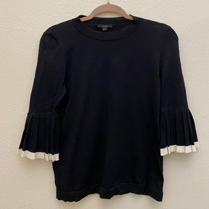 Cos black with white top